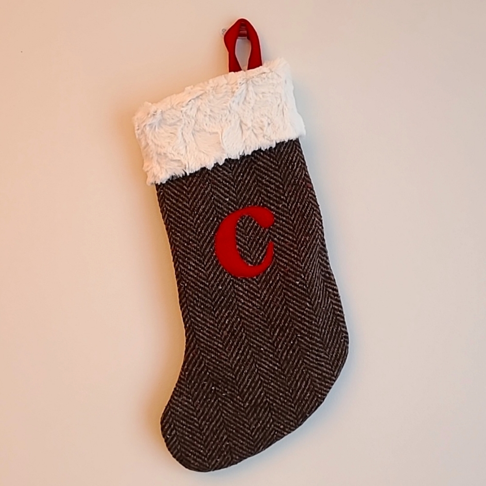 "C" Monogramed xmas stocking. White faux fur cuff & lined w/red wool felt.